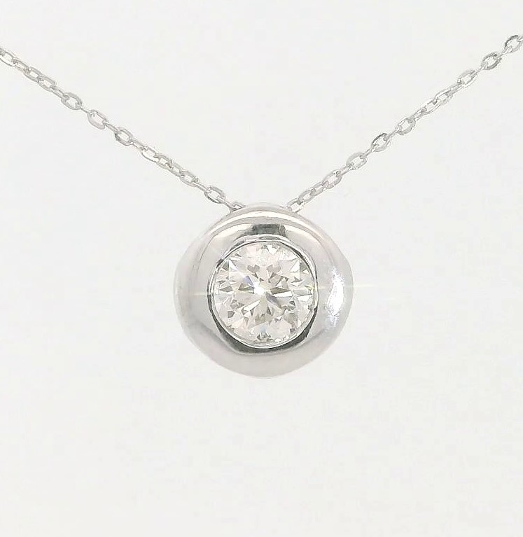 COLGANTE CHATON FUNDICION ORO BLANCO 7MM.BRILLANTE H-SI 1 . 0.25 CT.