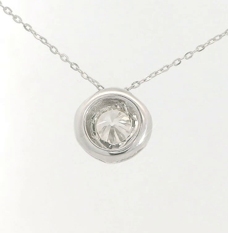 COLGANTE CHATON FUNDICION ORO BLANCO 7MM.BRILLANTE H-SI 1 . 0.25 CT.