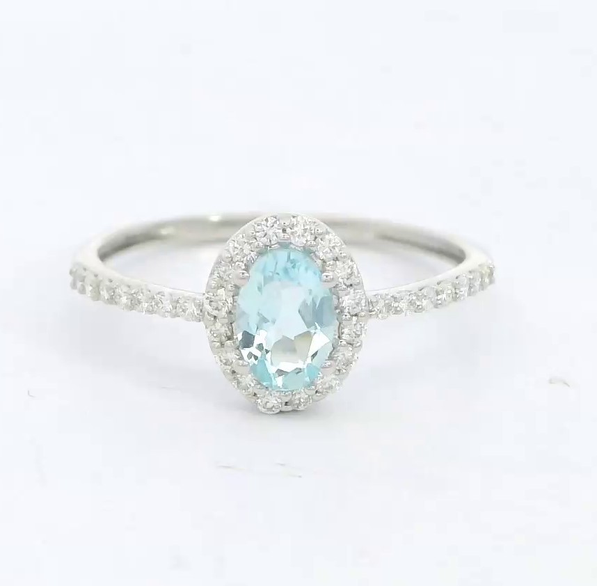 SORTIJA  BRILLANTES DI 20 RD VSI H 0.18 4 RD 0.023 DI 6 RD 0.043 1 AGUA MARINA 0.42 CT.0.22 CT TW