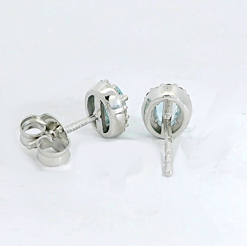 PENDIENTES BRILLANTES AGUA MARINA 0.84 CTR Y BRILLANTES DI 8 RD SI 0.04 RD20 0.14 DI32RD 0.26 CT