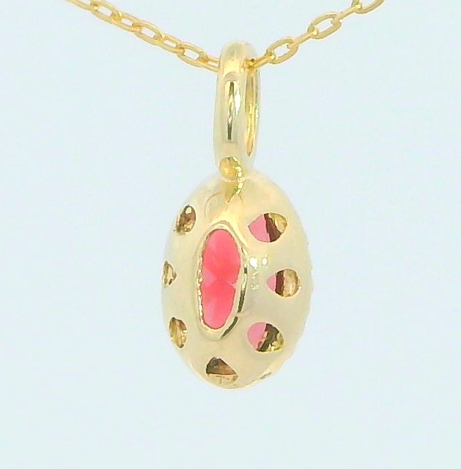 COLGANTE OVAL NANO GRANATE DE 6x4MM.9 KILATES