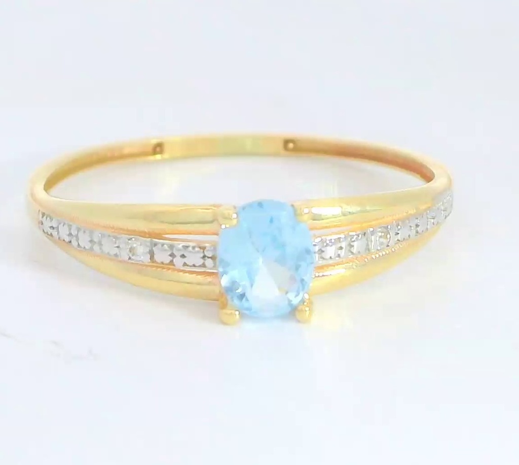 SORTIJA CIRCONITA COLOR AGUA MARINA DE 5x4MM. 9KILATES