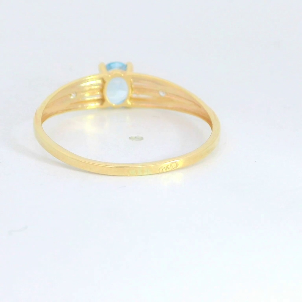 SORTIJA CIRCONITA COLOR AGUA MARINA DE 5x4MM. 9KILATES