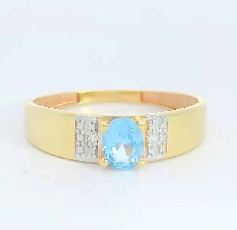 SORTIJA BICOLOR  CIRCONITA COLOR AGUA MARINA DE 5x4MM. 9 KILATES