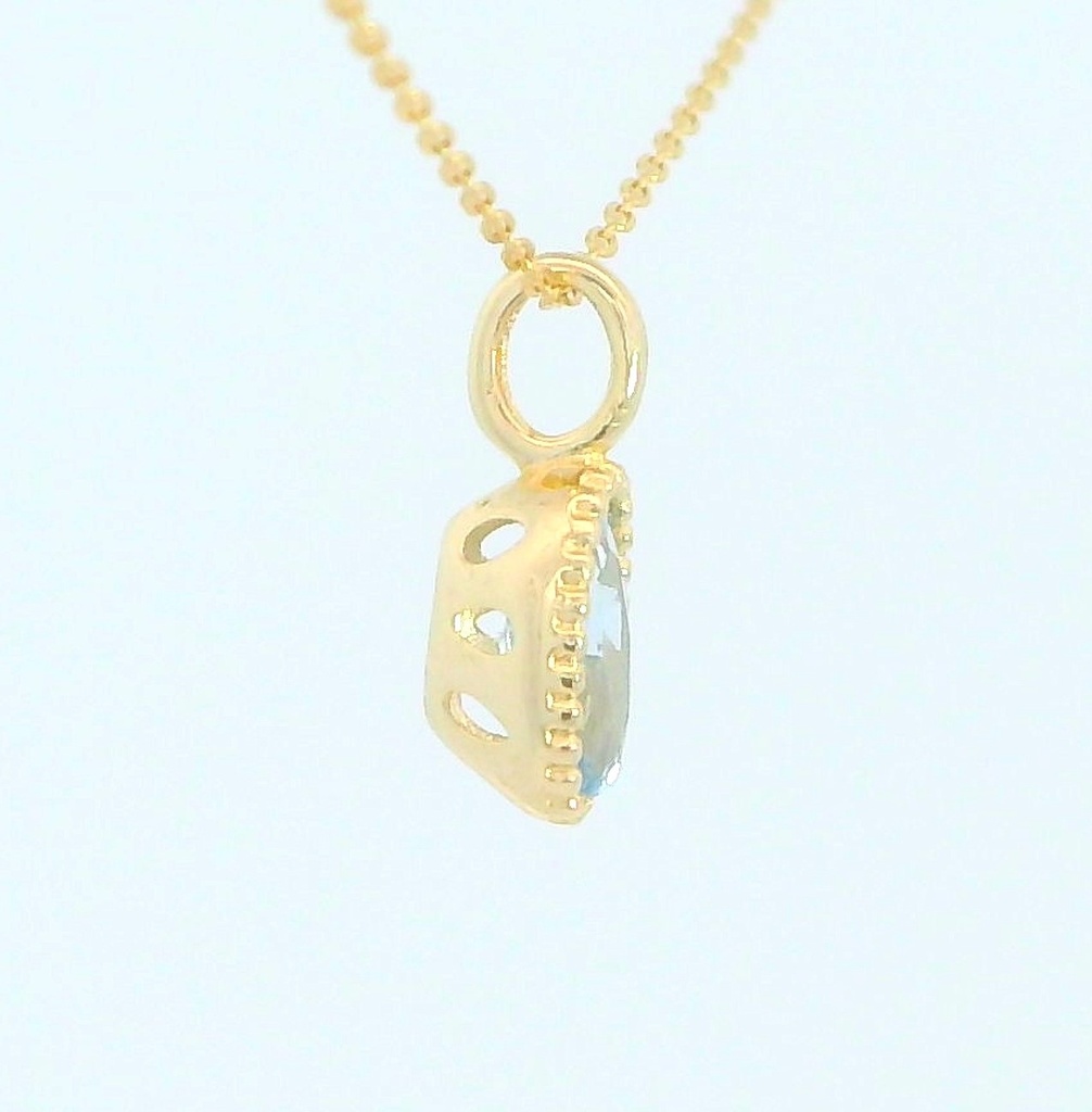 COLGANTE OVAL 6X4MM COLOR AGUAMARINA.9 KILATES