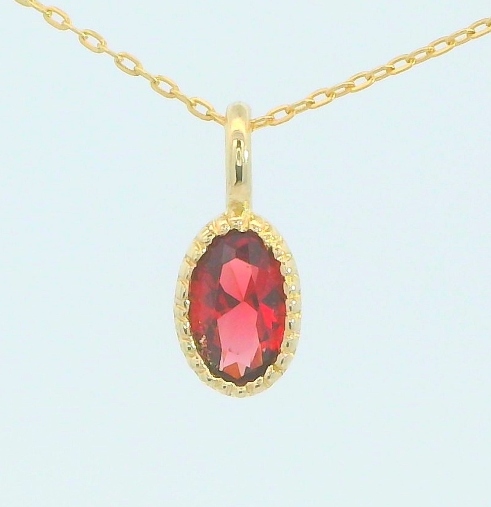 COLGANTE OVAL NANO GRANATE DE 6x4MM.9 KILATES