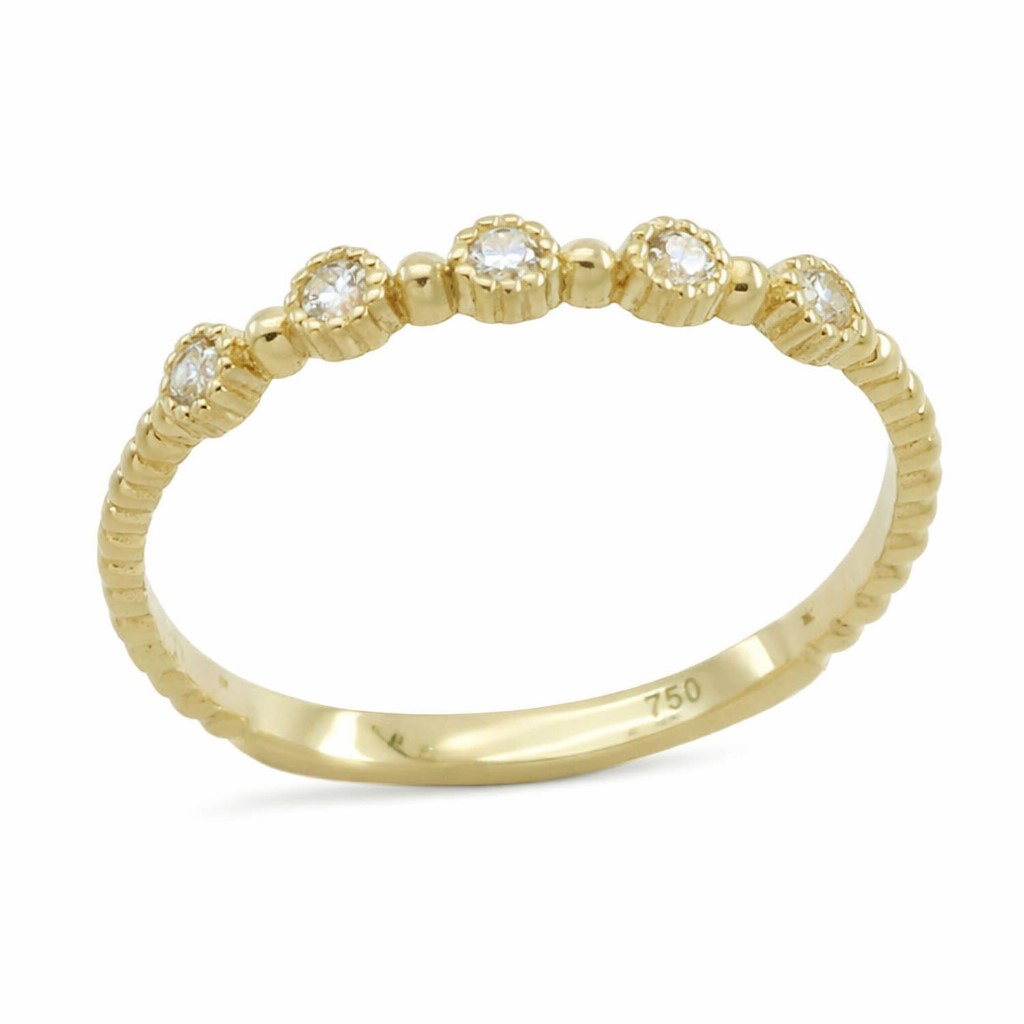 FIVE BEZELS CZ RING.