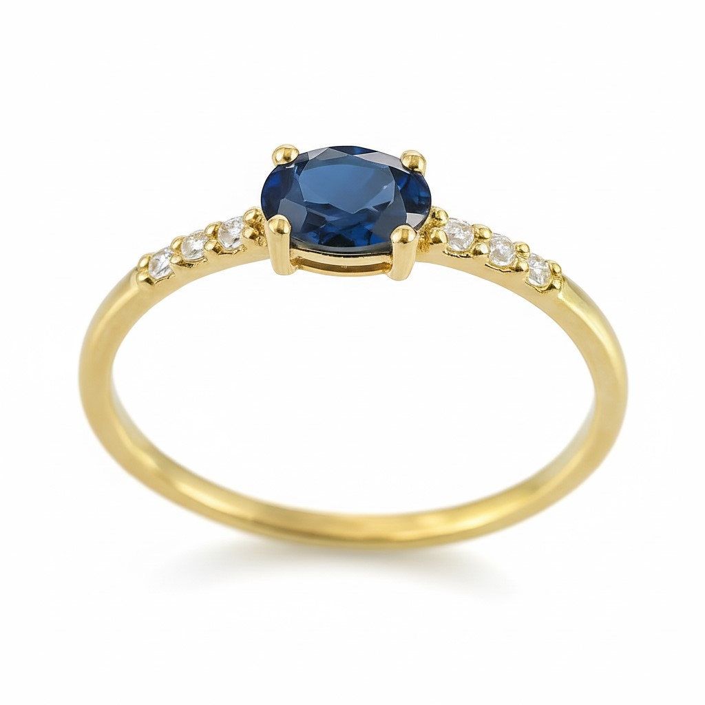 SORTIJA ZAFIRO OVAL DE  5x3MM Y CIRCONITAS.