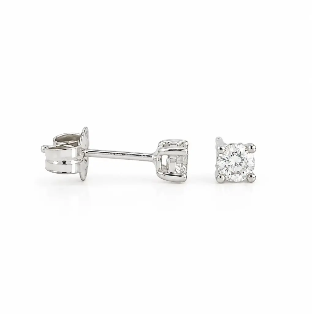DIAMOND STUD EARRINGS.QUALITY SI.COLOR H. 0.10 CT TW.2'5MM