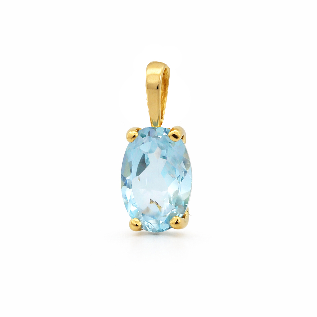 7x5MM BLUE TOPAZ PENDANT.9 KARAT GOLD 