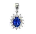 0.64 CT OVAL SAPPHIRE AND DIAMONDS PENDANT.QUALITY SI, COLOR H.0.15 CT TW