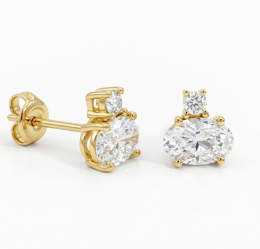  6X4MM OVAL CZ STUD EARRINGS.9 KARAT