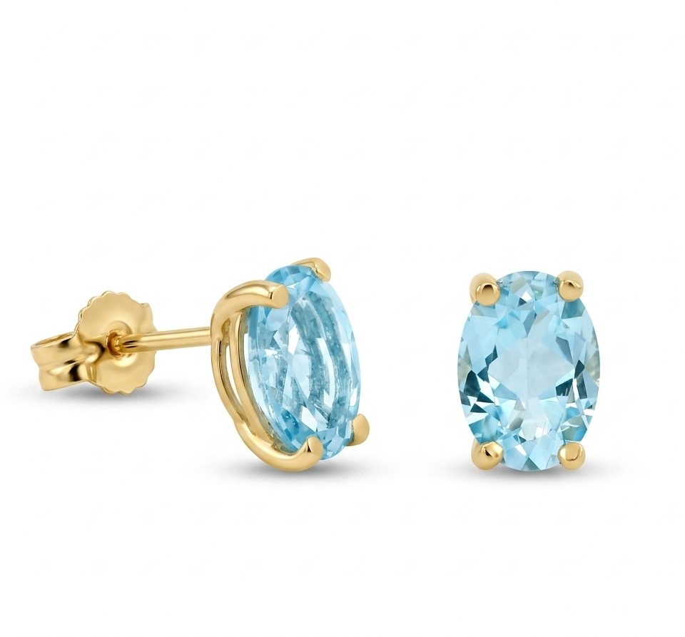 7x5MM BLUE TOPAZ STUD EARRINGS.9 KARAT