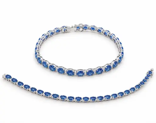[B4260Z] PULSERA RIVIERE DE BRILLANTES Y ZAFIROS.18CM DI 56RD SI H 0.31Y 27 ZAFIROS 10.62 CT TW.ORO BLANCO