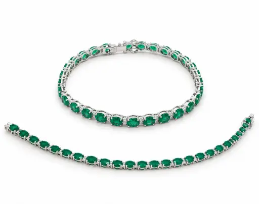 [B4260E] PULSERA RIVIERE DE BRILLANTES Y ESMERALDAS.18CM DI 56RD SI H 0.31Y 27 ESMERALDA 10.62 CT TW.ORO BLANCO 